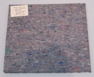 Joseph Beuys - DDR-Filz, 1979, felt typewriter pad with handwritten addition, stamped