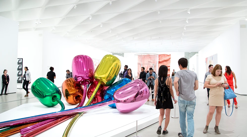 Busy third floor galleries featuring Jeff Koon's Tulips sculptures